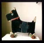Photograph (colour) - toy dog on wheels - made by Italian P.O.W. at Eden Camp; 2394