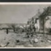 Official copyrighted war photograph- 15th August 1940- bomber wreckage amongst debris of damaged house; 56546