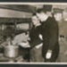 Official copyrighted war photograph - 14th November 1939 0 2 German officer prisoners cooking in a P.O.W. camp; 56573 Official copyrighted war photograph - 14th November 1939 0 2 German officer prisoners cooking in a P.O.W. camp; 56573