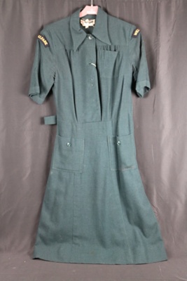 W.V.S.. uniform dress, with welfare cloth insignia still attached; 49618 W.V.S.. uniform dress, with welfare cloth insignia still attached; 49618