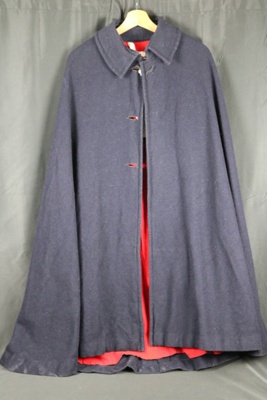 Nurses cape, blue wool with red lining, JH Bounds, t/a stethos, 1940s; 74898 Nurses cape, blue wool with red lining, JH Bounds, t/a stethos, 1940s; 74898