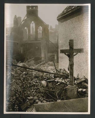 Official copyrighted war photograph- 11th September 1940- crucifix remains untouched amongst the debris of demolished church; 56539