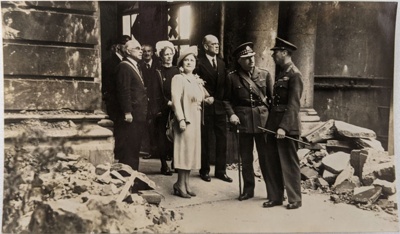 Black and white photograph of HRH King George VI and Queen Elizabeth visiting St Thomas' Hospital during WWII; 1940; 1026