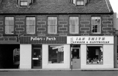 fht.2026.101  pullars of perth, cleaners, at 45 high steet, from 1926 to 1980, and ian smith, plumbers, at 45a high street, from 1962 to 1981, pictured in 1963.