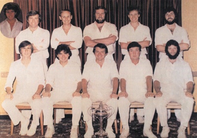 Facsimile - A4 colour printed image of Briars Cricketers, Players are posed in front of a trophy. Year unknown. ; P0232 Facsimile - A4 colour printed image of Briars Cricketers, Players are posed in front of a trophy. Year unknown. ; P0232