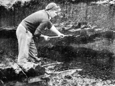 Photograph, William 'Dod' McWilliams cutting peat; 1950s; CT.2024.02.31