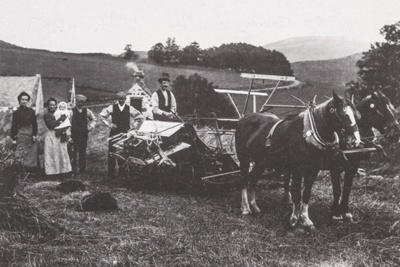 Photograph, family group and horse drawn binder, Greenloan, Cabrach; 1940s; CT.2023.03.29