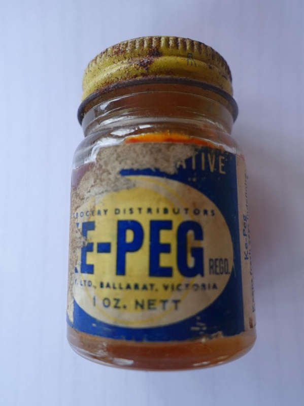 glass-jar-of-ke-peg-egg-preservative-with-a-metal-lid-some-contents