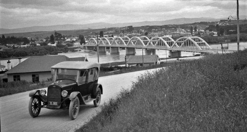 Bridge. Multiple Arch Reinforced Concrete Bowstring Bridge. Balclutha Road ( SH1 ). Balclutha. Over the Clutha River. Erected 1933. With Motor Vehicle, a Ford Model T, Otago, New Zealand.