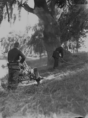 Fire, Fire Brigade Training with Light Trailer Pump, Avon River, Christchurch, Canterbury, New Zealand. 1 image item