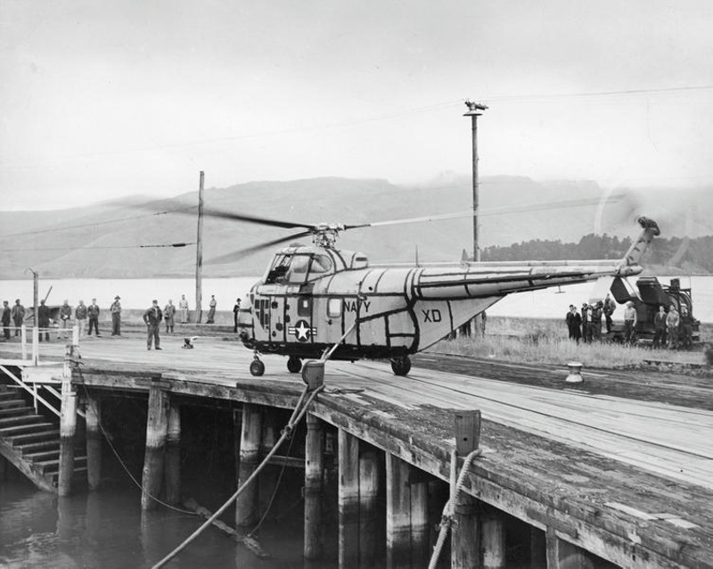 Navy. Aviation. US Navy Helicopter. Sikorsky H-19, Chickasaw. On the Wharf at Lyttelton, Operation Deep Freeze Expedition to Antarctica. Canterbury, New Zealand. ( Shortly before it Crashed into the Harbour).