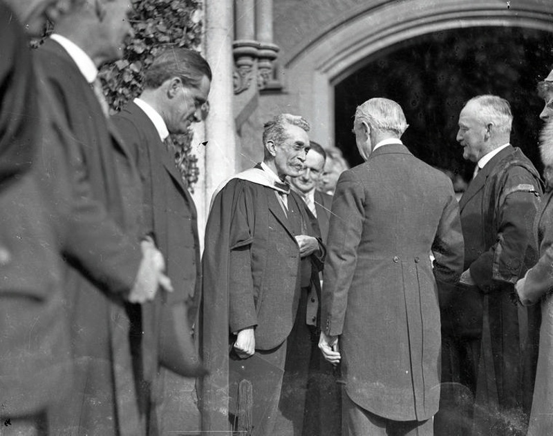 Men in Academic Regalia. Man in Long Tails Appears to be the Governor-General Sir Bernard Fergusson? Canterbury University College. Christchurch, Canterbury, New Zealand.