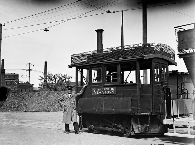 Tram. Kitson Steam Tram No 7. Operated in 1879. With Driver. The Back of the Stairway of its Double Decker Trailer Can be Seen on the Right. Christchurch, Canterbury, New Zealand.