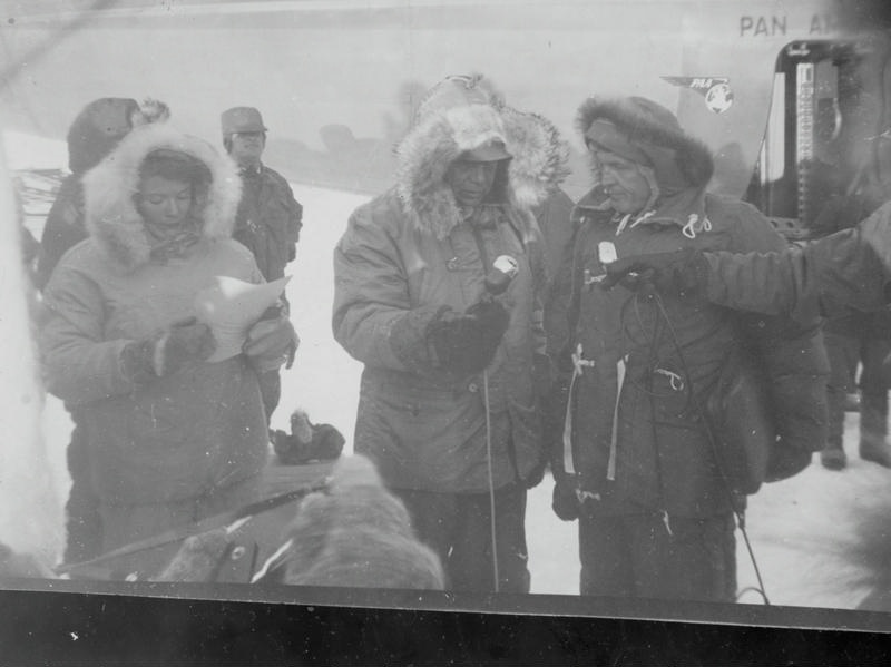 Antarctica. Interview. Unidentified Personnel.l A Pan American Boeing 377 Stratocruiser Aircraft Behind. Testing Commercial Flights in this Environment. McMurdo Sound. First Commercial Flight to Antarctica And Reputedly the First two Women to Antarctica , Stewardesses Aboard the Plane, Ruth Kelly and Patricia Hepinstall.