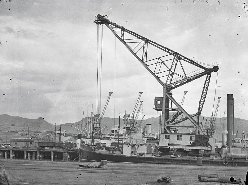 Reverse Image Shipping, "Rapaki," 1926, 762 GRT. the Lyttelton Harbour Board 80 Ton Floating Steam Crane. Berthed at her Wharf, Lyttelton Port, Canterbury, New Zealand.