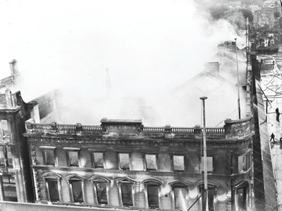 Ballantyne's Fire, Colombo Street Frontage with Cashel Street on the right with Firemen and the Bridge of Remembrance in the distance. Christchurch, Canterbury, New Zealand. image item