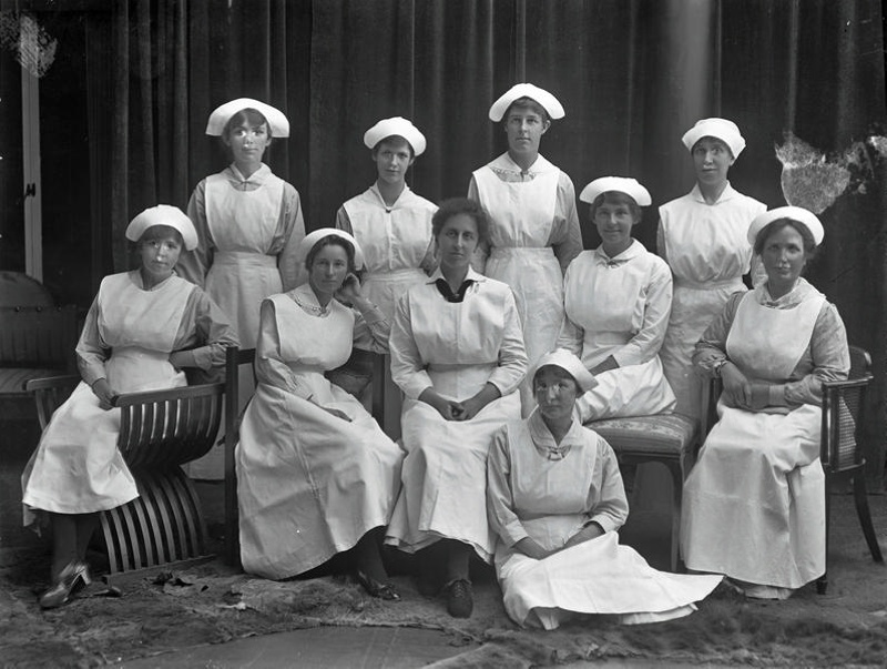 Portrait. Miss Bick. Group of 12. Nurses? Christchurch, Canterbury, New Zealand