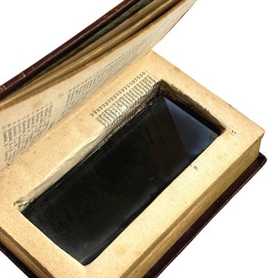 Religious book with a secret compartment with private nudes; c. 1900; M-A017