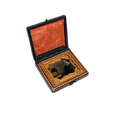 Woman with a stereoscope - cased Ambrotype; c. 1860; M-A007
