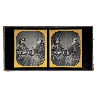 Stereo Ambrotype of two women with a Brewster Stereoscope; c. 1860; M-V011 Stereo Ambrotype of two women with a Brewster Stereoscope; c. 1860; M-V011