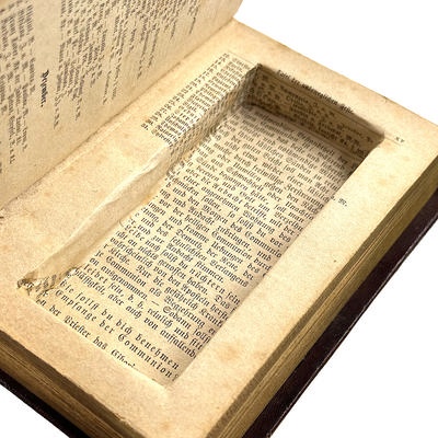 Religious book with a secret compartment with private nudes; c. 1900; M-A017
