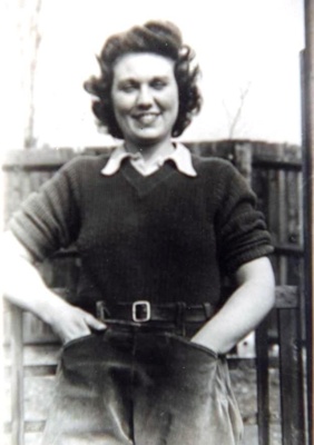 A photograph showing a member of the WWII Women's Land Army in her ...