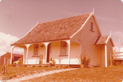 Sergeant Barry's cottage in Howick Historical Village, showing a path up to the verandah/; April 1981; P2020.128.08
