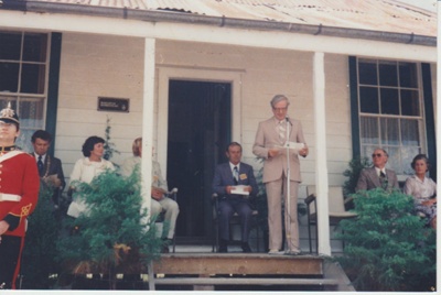 The official party on the verandah of Eckfords Homestead.; 8/03/1980; 2019.100.23