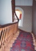 Staircase at Puhinui, McLaughlin's Homestead at Howick Historical Village, 1990; Alan La Roche; 1990; P2020.08.07