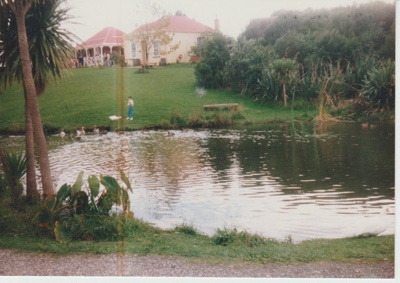 Looking across the pond at the Howick Historical Village; 1990; 2019.122.01