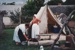 Debbie Benson in costume and another lady outside a soldier's tent on a Live Day at  HHV.; 2019.199.14