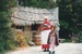 A lady and girl in costume outside the Sod Cottage, Howick Historical Village on a Live Day.; La Roche, Alan; 2003; P2020.43.38