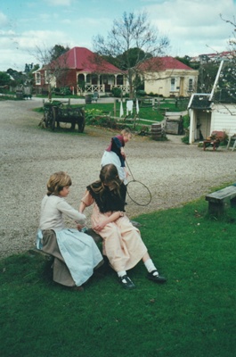 Three girls in costume, at a Live Day in Howick Historical Village. ; La Roche, Alan; 8 May 1994; P2021.129.21