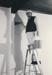 Toby Gilmour wallpapering the drawing room in Puhinui.; July 1991; P2020.14.33