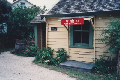 Maher Cottage prepared as a Post Office for the filming of 'Savage Play' at Howick Historical Village. ; 1995; P2022.31.15