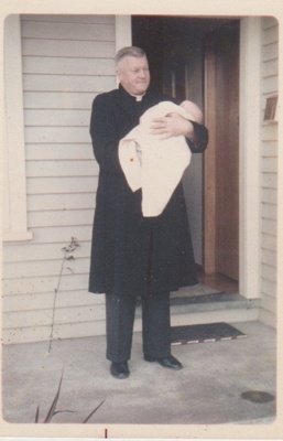 Reverend Robert Hattaway holding Andrew Kidd, his godson.; 1/07/1962; 2018.375.04
