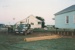 The transporter leaving White's Homestead in its new home at Howick Historical Village.; La Roche, Alan; 6 November 1995; P2021.65.06