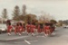 The Howick Pipe Band marching along Cook St, Howick.; 1982; P2021.137.02