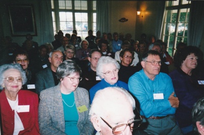 Kath Sibun, Jan White, Pat and David Wighton, Claryce Hart-Smith and George Lee (in front of them) at the 50th anniversary celebration of the Howick and Districts Historical Society in Bell House.; La Roche, Alan; 20 May 2012; P2022.27.10