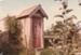 The outhouse once belonging to Jean Batten's family, now at Howick Historical Village. ; La Roche, Alan; September 1984; P2021.89.03