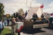 Members of the Historical Society on a float in the Christmas Parade.   1995. This is a rear view.; 1995