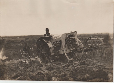Early tractor ploughing in South Auckland.; c1920s; 2017.587.40