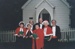 Carollers outside the Methodist Church at Howick Historical Village, December 2001.; La Roche, Alan; December 2001; P2022.05.08.11