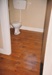 Completed toilet and vinyl floor at Puhinui after renovation.; September 2003; P2020.14.35