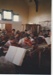 Howick Intermediate School Orchestra playing in Pakuranga School; La Roche, Alan; 1980s; 2019.081.06