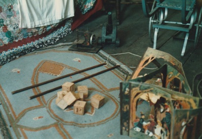 Toys on the floor of the bedroom in Briody-McDaniel Cottage.  ; La Roche, Alan; November 1989; P2020.104.09