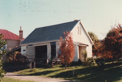 Wagstaff's Forge in Howick Historical Village. Derelict machinery is outside.; Harris, Josie; February 1983; P2020.152.01