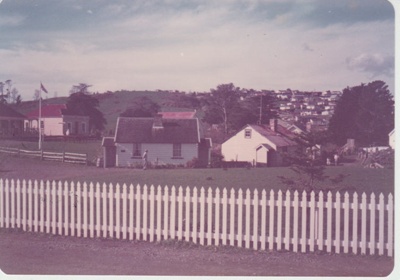Looking across the picket fence to cottages; La Roche, Alan; 1/03/1983; 2019.109.06