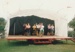 Hungarian dancers on the stage at Howick Historical Village during May Day celebrations.; May 1990; P2021.169.03