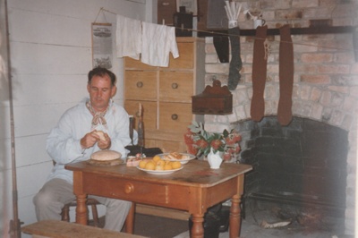 Richard Lees (former Education officer) in costume inside Briody-McDaniels Cottage, formerly McDermott's Cottage at Howick Historical Village.

; La Roche, Alan; P2020.101.13